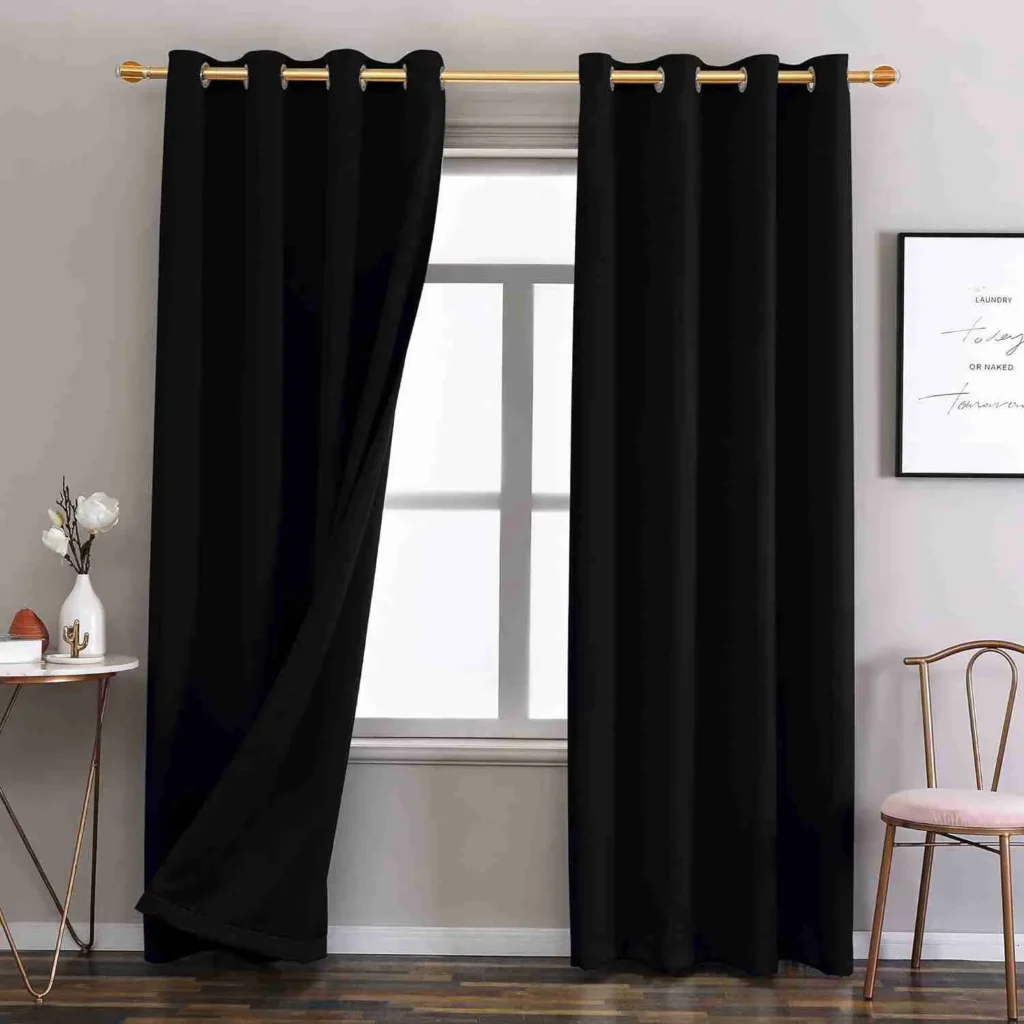 blackout curtains hanging on window