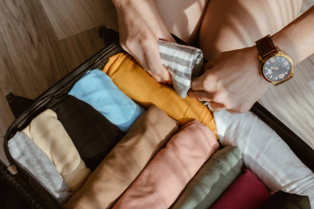 Roll Up Your Shirts Like A Travel Expert
